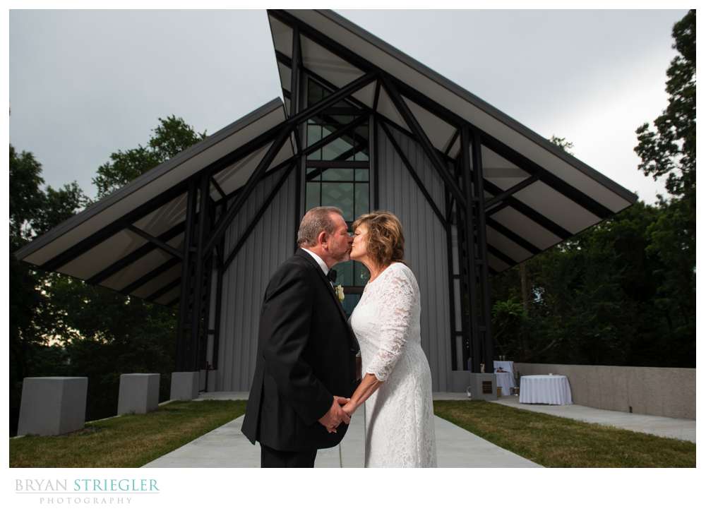 couple outside of the CLC glass chapel